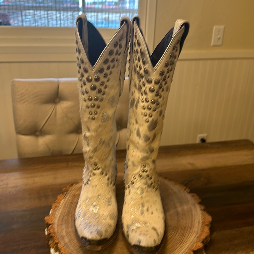“Wild Hair” Cowboy boots silver and white studded. Would be fun for wedding.